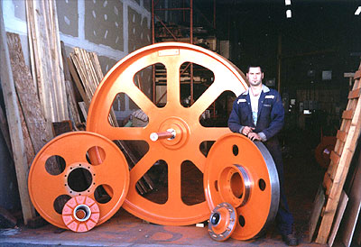 7' Dia. x 12" Face Top Bandwheel with a pair of 44" Dia. x 4 3/8" Face Bandwheels c/w Hub