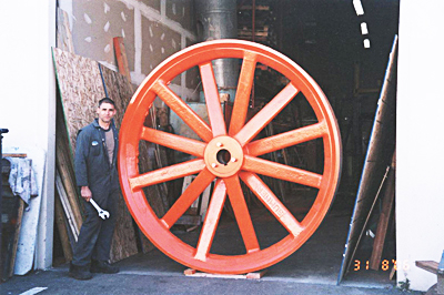 8' x 12" Face Cast Bottom Bandwheel previously used on an older machine and reworked to suite a new customer's existing headrig